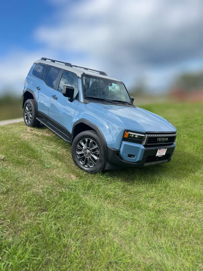 2025 Toyota Land Cruiser Heritage Blue front off-road angle – JOE build